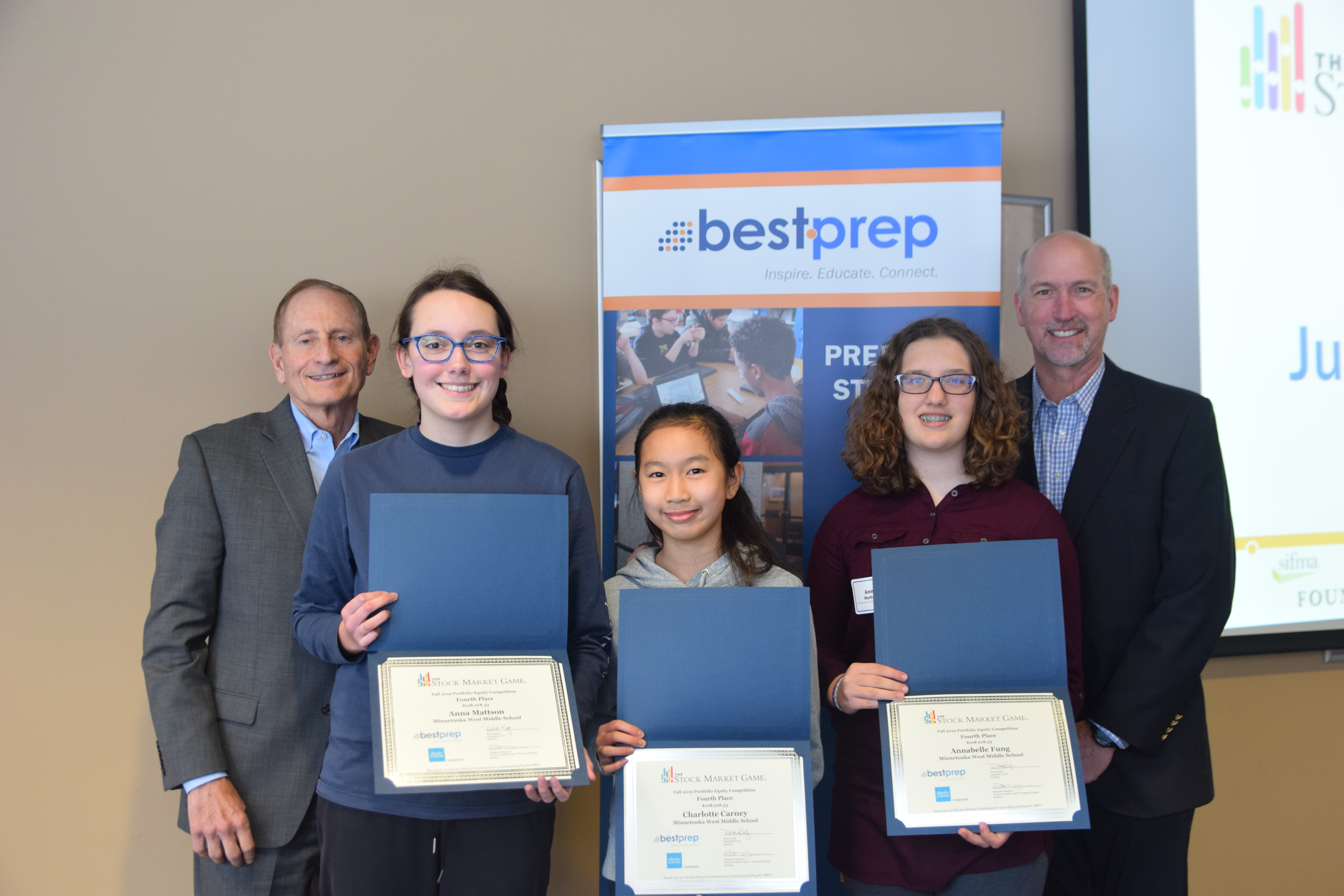 Students posing for Stock Market Game awards