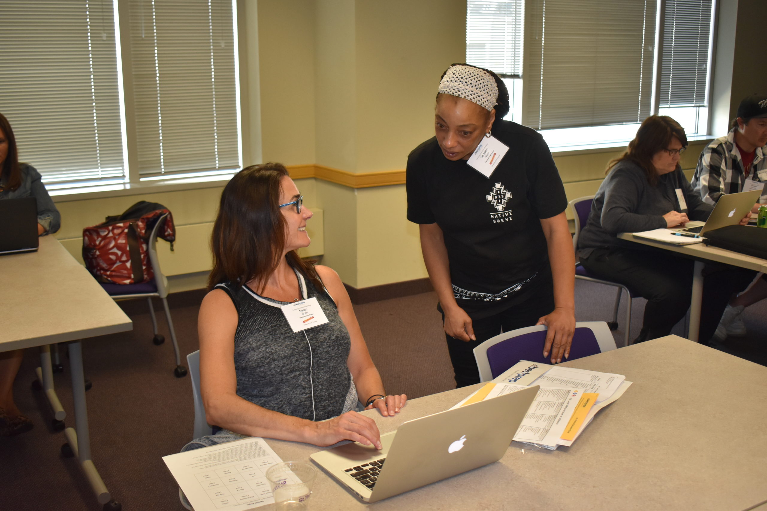 teachers at laptop