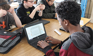 student at laptop