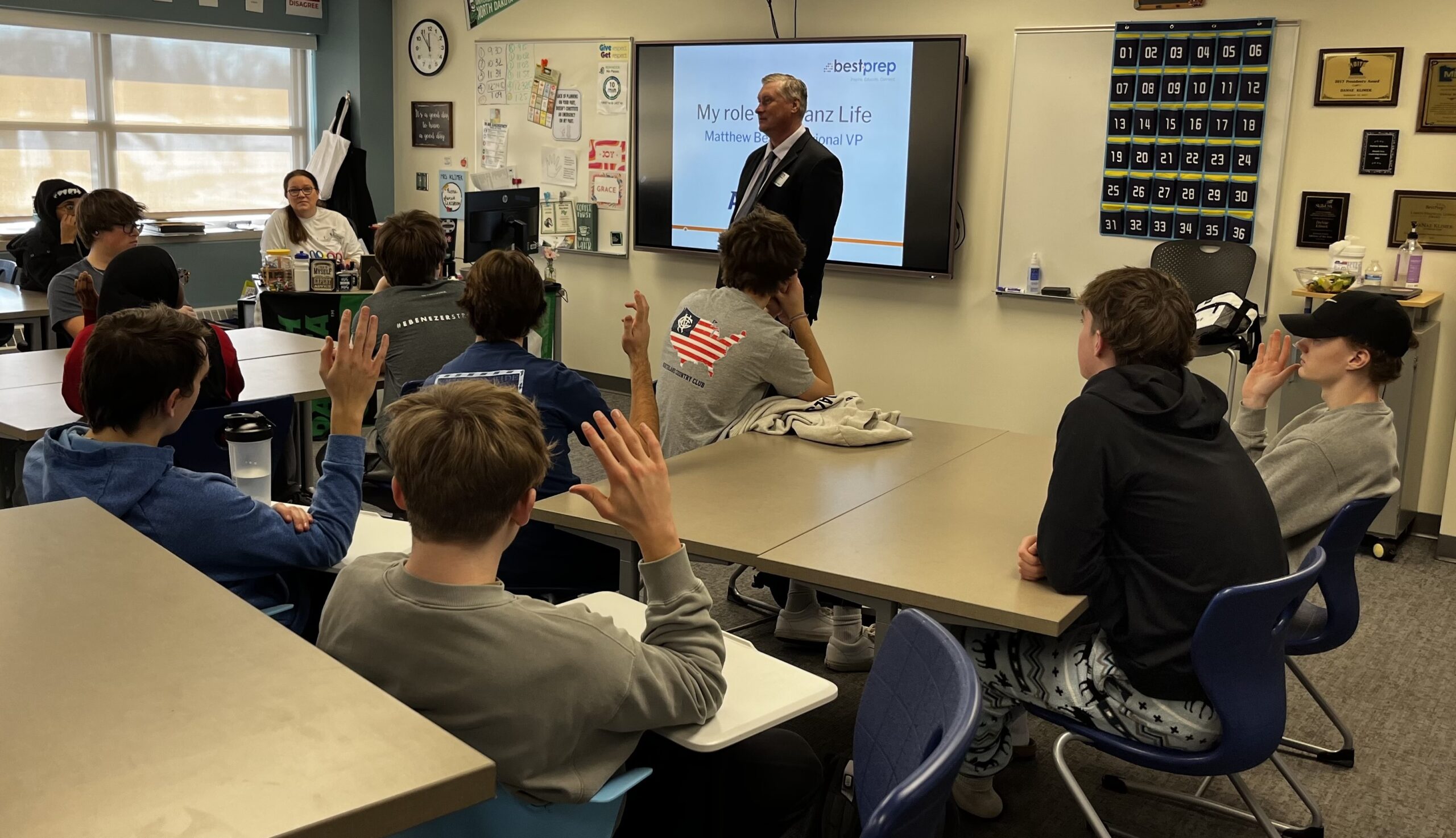 Matthew and students candid interacting2